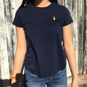 A navy blue Ralph Lauren polo t shirt.